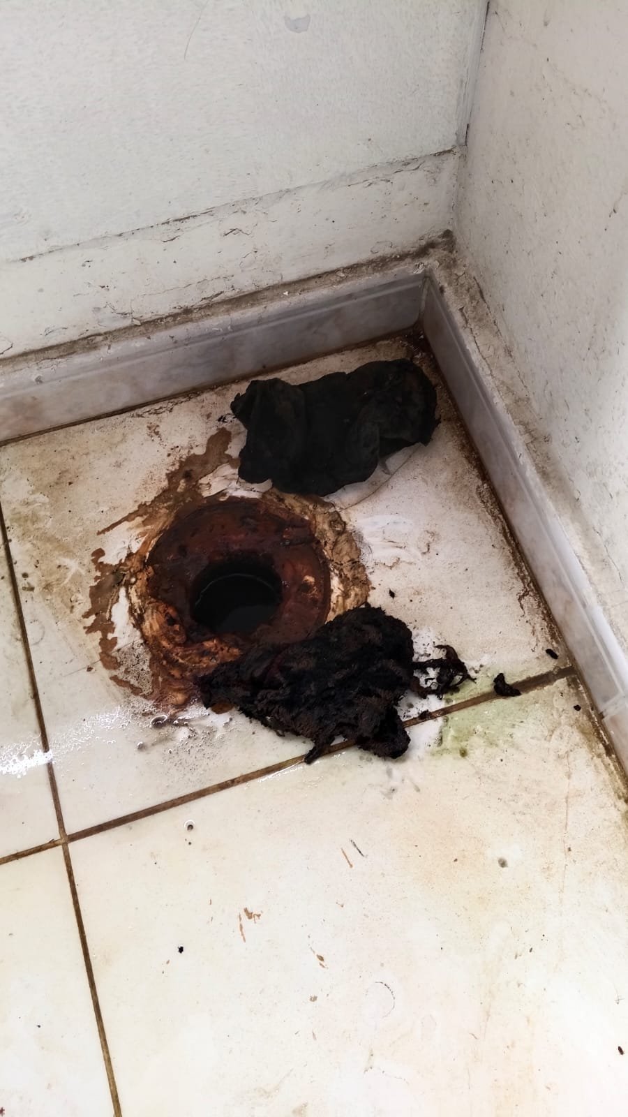 Blocked floor drain and pipe repair assessment