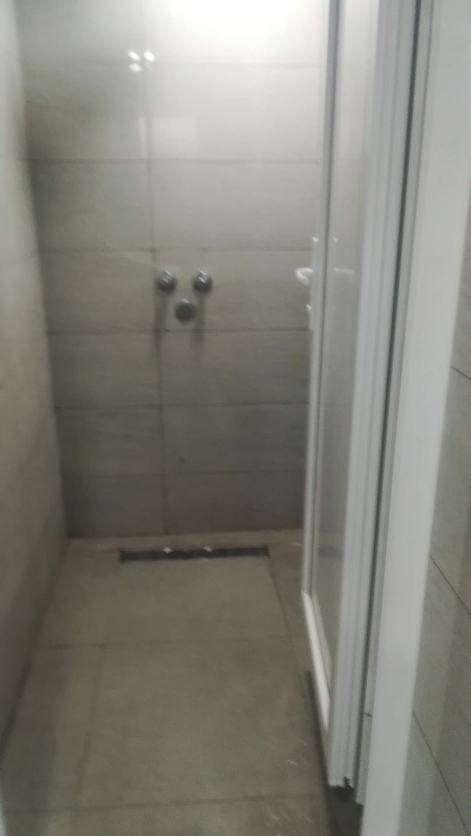 Shower enclosure with professional tile installation
