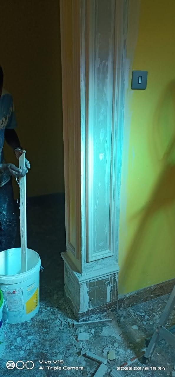 Interior painting with premium yellow-green paint application